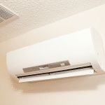 a white air conditioner on a wall